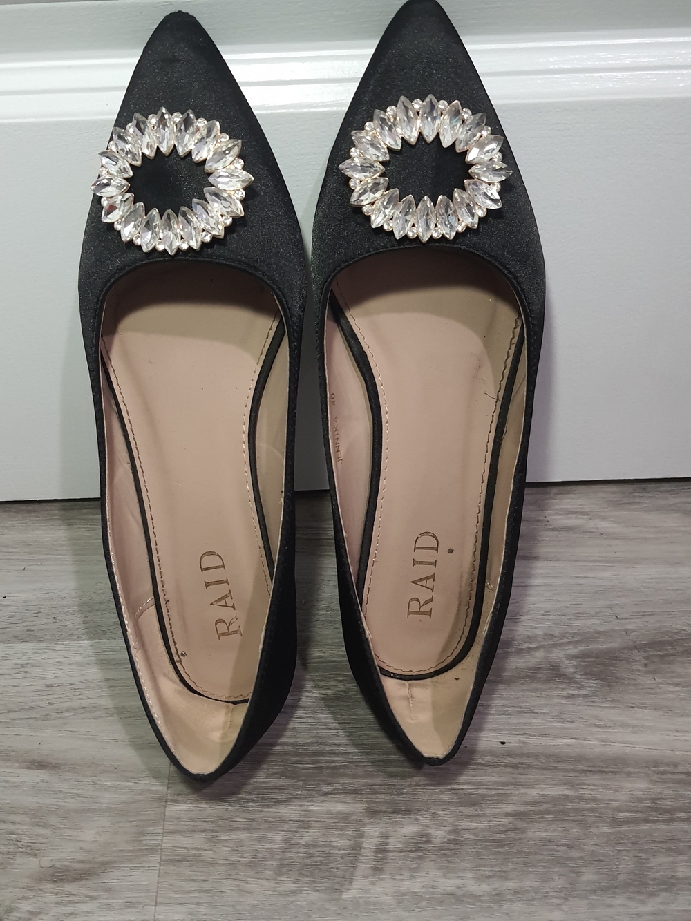 RAID Black Pointed Toe Flats with Crystal Circle Accent